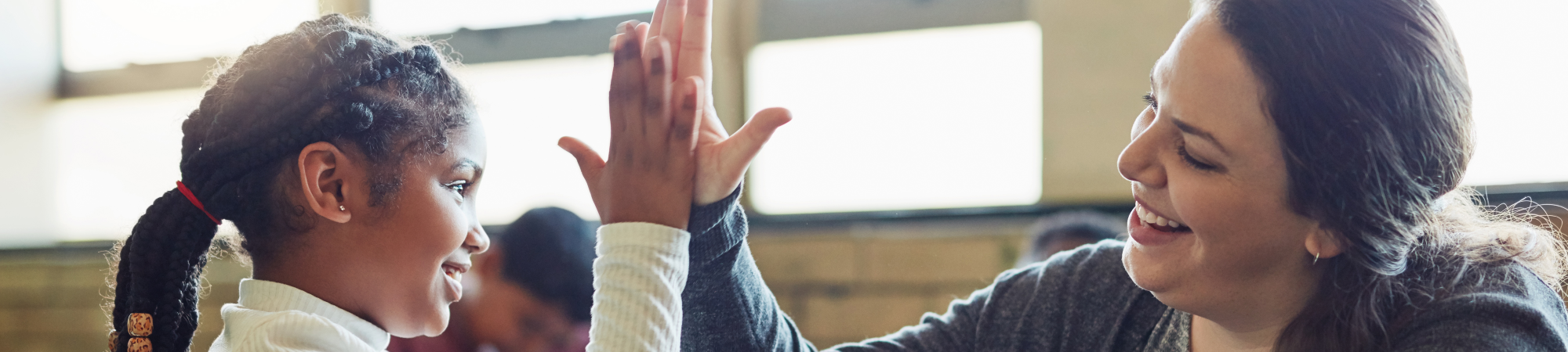 Image CIS benefits teacher high five