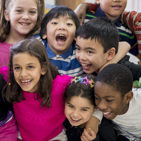 international tile - children laughing in group